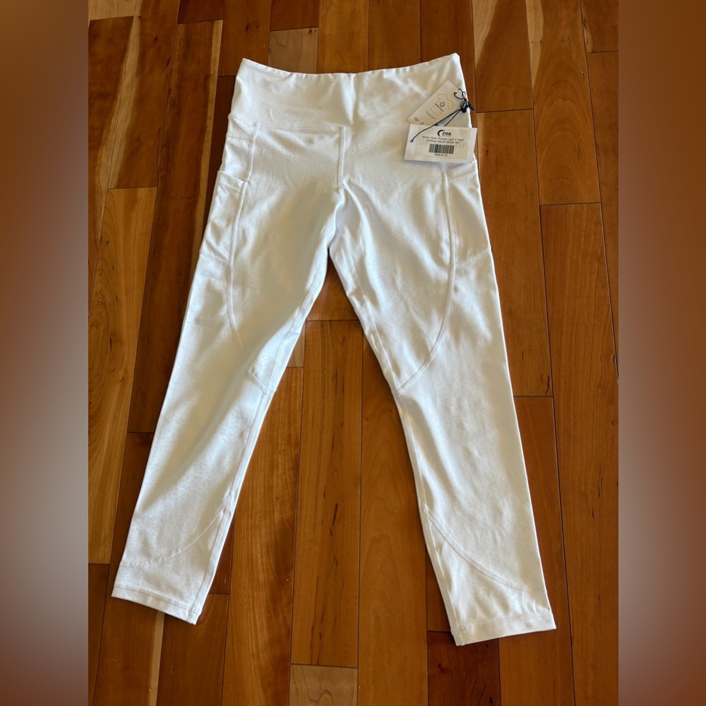 ZYIA Women's Viper Leggings size 8
NWT